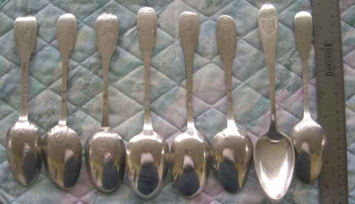 set of 8 spoons engraved with initials, names and dates