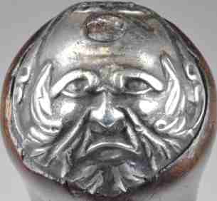 silver 'grotesque' pistol buttcap