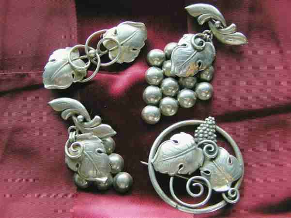 Early 'Candida' marked designs in which combinations of cups and leafs are combined with wirework