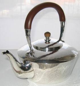 Silver tea kettle manufactured by Liberty & Co,  hallmarked in Birmingham in 1924