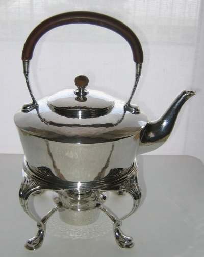 Silver tea kettle manufactured by Liberty & Co,  hallmarked in Birmingham in 1924