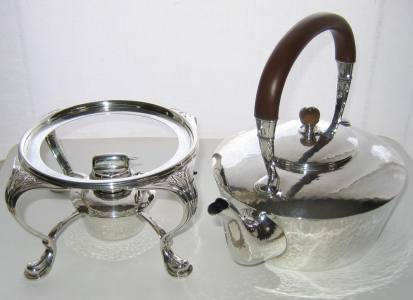 Silver tea kettle manufactured by Liberty & Co,  hallmarked in Birmingham in 1924
