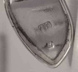 TO hallmark overstruck inside bottle lid