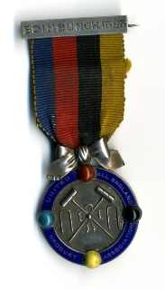 silver medal inscribed United All England Croquet Association