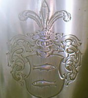 silver beaker with crest