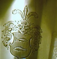 silver beaker with crest