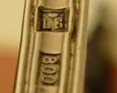 silver cutlery marked '800'