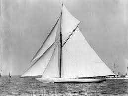 The sloop Defender on the water