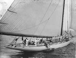 The sloop Defender on the water
