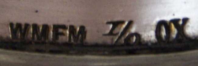 WMF mark on silver plate coasters