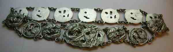 heavy cast silver belt of unknown origin