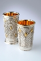 two beakers by Wally Gilbert