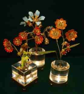 Plexiglas containers used for Faberg-inspired single blooms