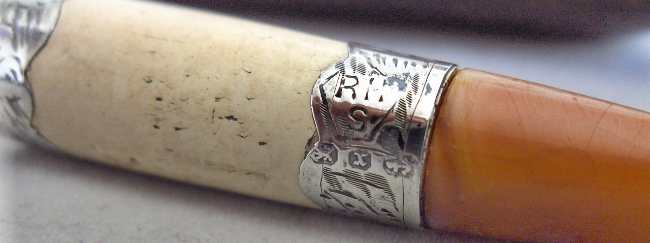 amber mouthpiece with silver complements