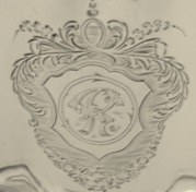 Cartouche engraved with 'R' initial