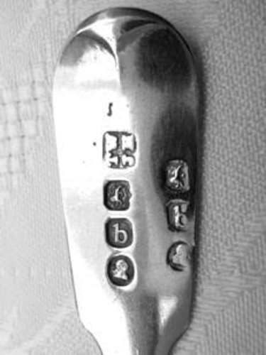 An 1817 spoon in which the marks have been struck twice by London Assay Office