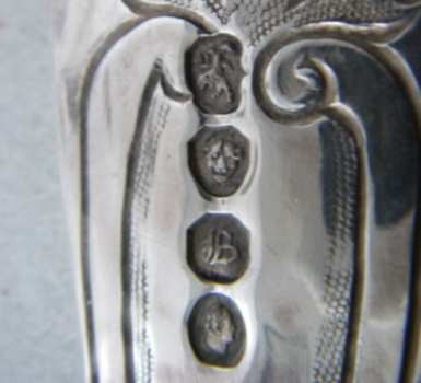 hallmark on William IV silver berry spoon