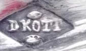 Silver tray marked KOTT