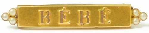 gold baby brooch