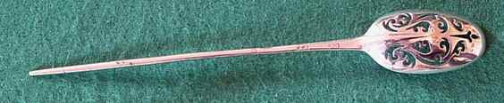 strainer spoon by William Lutwick struck with his mark and the lions head erased