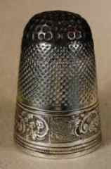 Steel topped silver thimble made by Hester Bateman