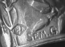 Signature of designer/engraver George Goursat