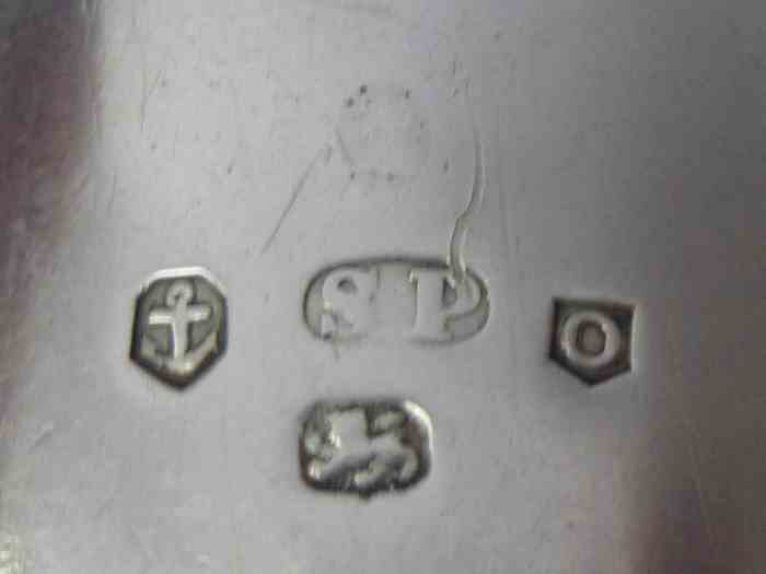 disguised duty mark on silver cheese scoop