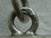 bigorne mark on the back side of the hanging ring