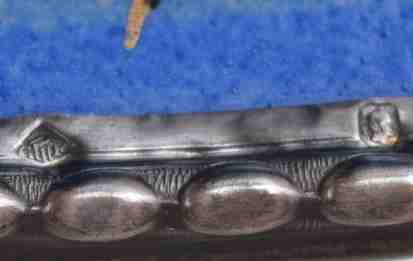 mark on silver mounts of a dish with Japanese decor
