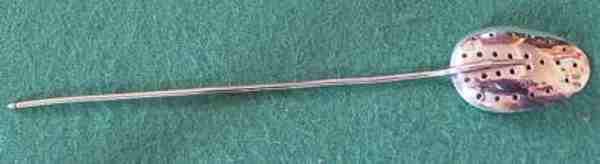 Mote spoon of about 1690 by Abraham Harache. (probably experimental)
