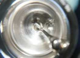 Underside of service bell with hallmarks, and clapper