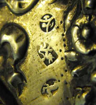 silver holy water font of unknown origin