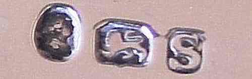 Press mark on tea tongs showing the duty mark first in the sequence
