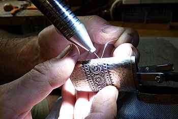 Jeffrey Herman restoring a sterling match safe