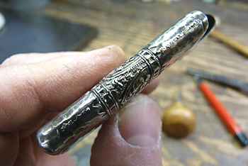 Jeffrey Herman restoring a sterling match safe