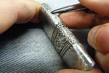 Jeffrey Herman restoring a sterling match safe