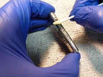 Jeffrey Herman restoring a sterling match safe
