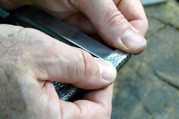 Jeffrey Herman restoring a sterling match safe