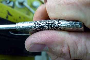 Jeffrey Herman restoring a sterling match safe
