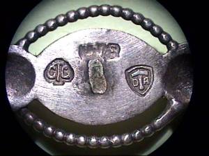 silver cufflink found while metal detecting in Oregon