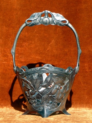 A silver-plated Art Nouveau basket made from tin-containing alloy between 1895 and 1915 A silver-plated Art Nouveau basket made from tin-containing alloy between 1895 and 1915