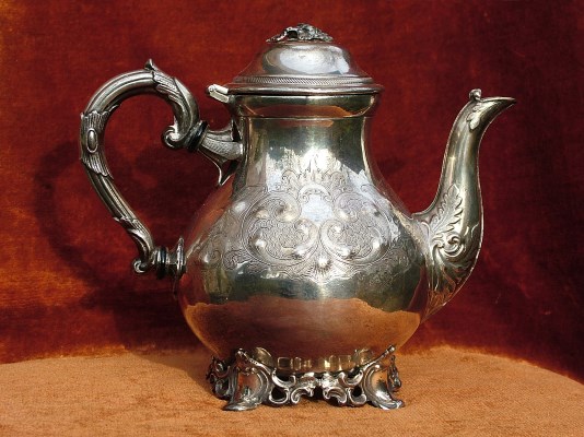 A metal jug produced by B.Bohrmann company using punching technology and dated 18.11.1876