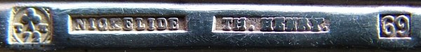 silver-plated fork issued in 1869 by Theodore Henry company mark