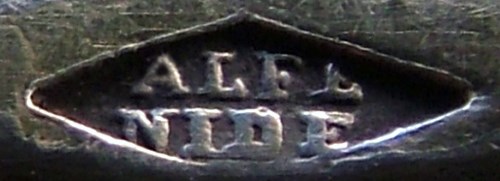 The lozenge-shaped box with the inscription ALFÉNIDE The lozenge-shaped box with the inscription ALFÉNIDE