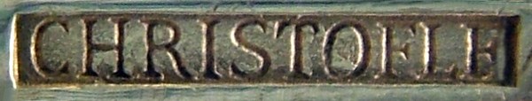 The inscription CHRISTOFLE in rectangular cartouche, used on silver-plated Metal Blanc
cutlery pieces, issued between 1877 and 1899 The inscription CHRISTOFLE in rectangular cartouche, used on silver-plated Metal Blanc
cutlery pieces, issued between 1877 and 1899