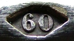 The production year marking on silver-plated Christofle cutlery between c.1844 and c.1859