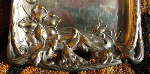 Fragment of Art Nouveau silver-plated tray made of nickel silver in 1903 Fragment of Art Nouveau silver-plated tray made of nickel silver in 1903