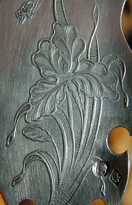 detail of an Art Nouveau butter knife