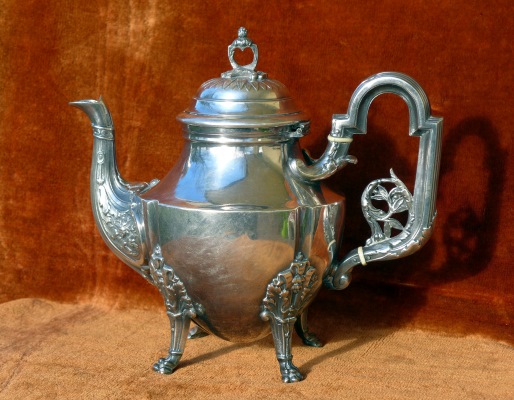 A silver-plated teapot (20 cm high) made of low-quality nickel silver before 1902