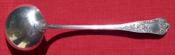 A 32 cm long ladle (silver-plated brass), issued in 1900